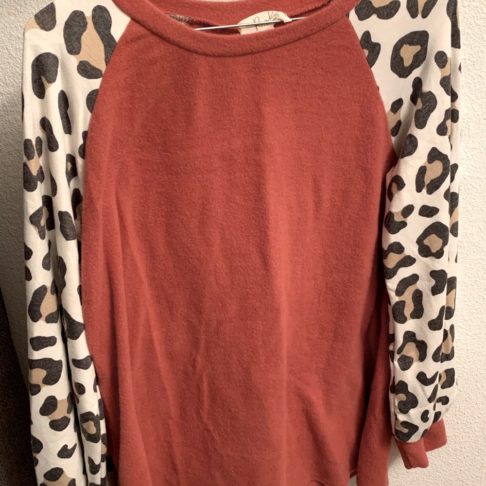 Size medium. Never worn.